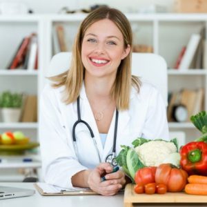 a sports nutritionist—one of the careers in the sport and fitness industries—creating a meal plan